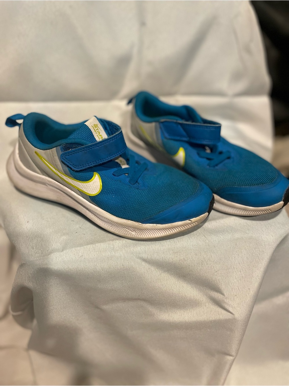 Nike Kids Blue Sneakers with Neon Yellow Swoosh